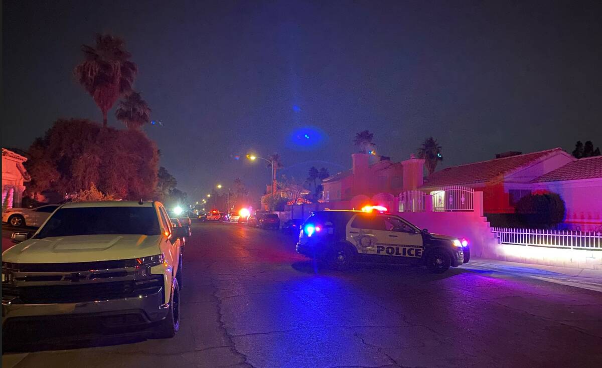 A Las Vegas police shooting was under investigation near Sloan Lane and Sahara Avenue on Wednes ...
