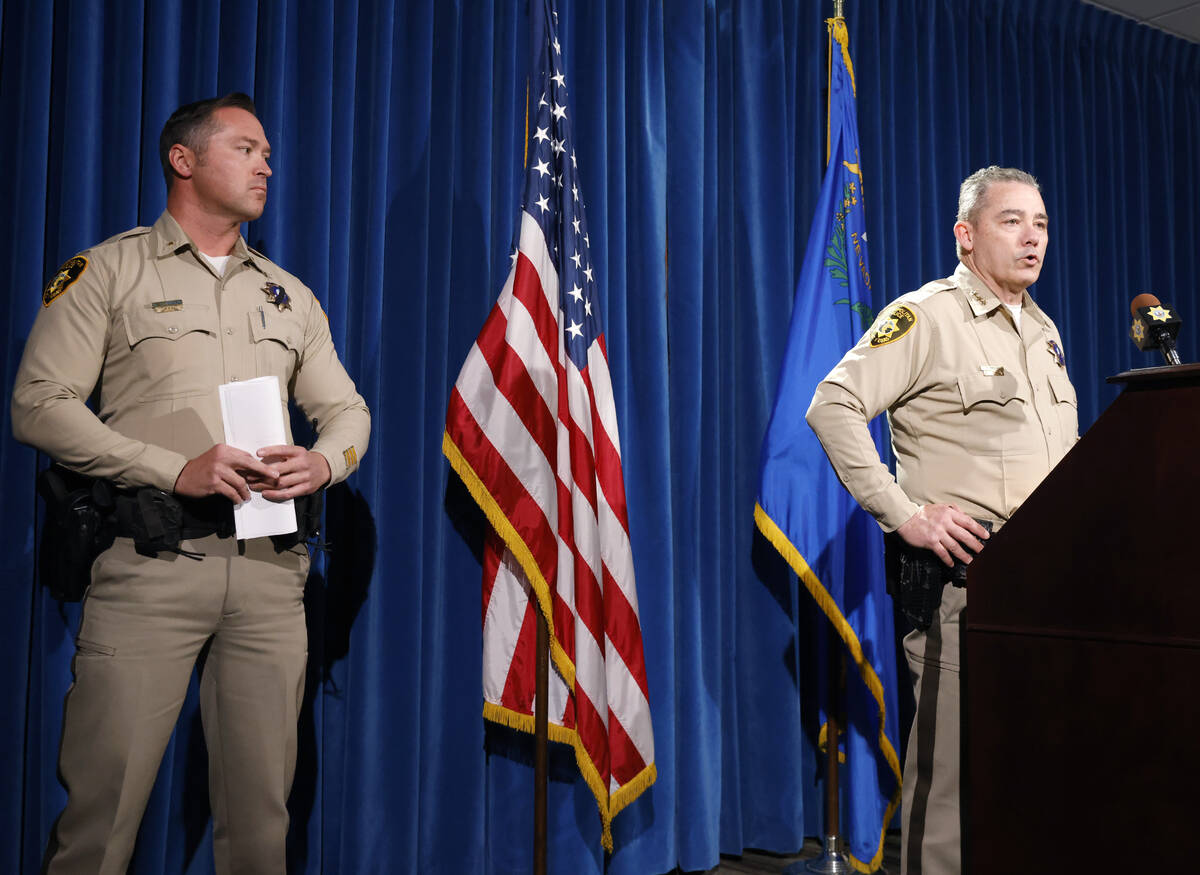 Undersheriff Andrew Walsh, right, speaks about two Nevada State Troopers that were skilled on I ...