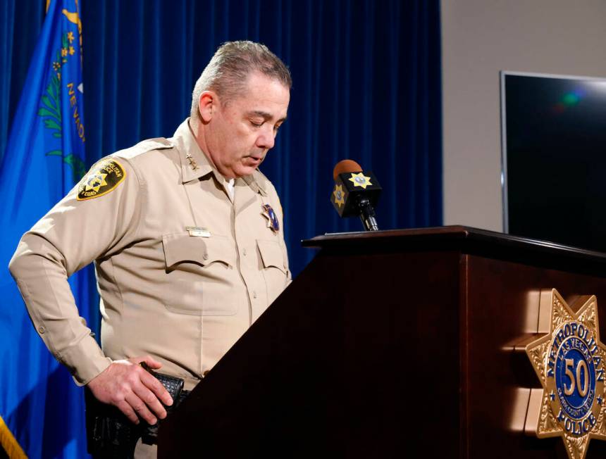 Undersheriff Andrew Walsh, right, pauses as he speaks about two Nevada State Troopers that were ...