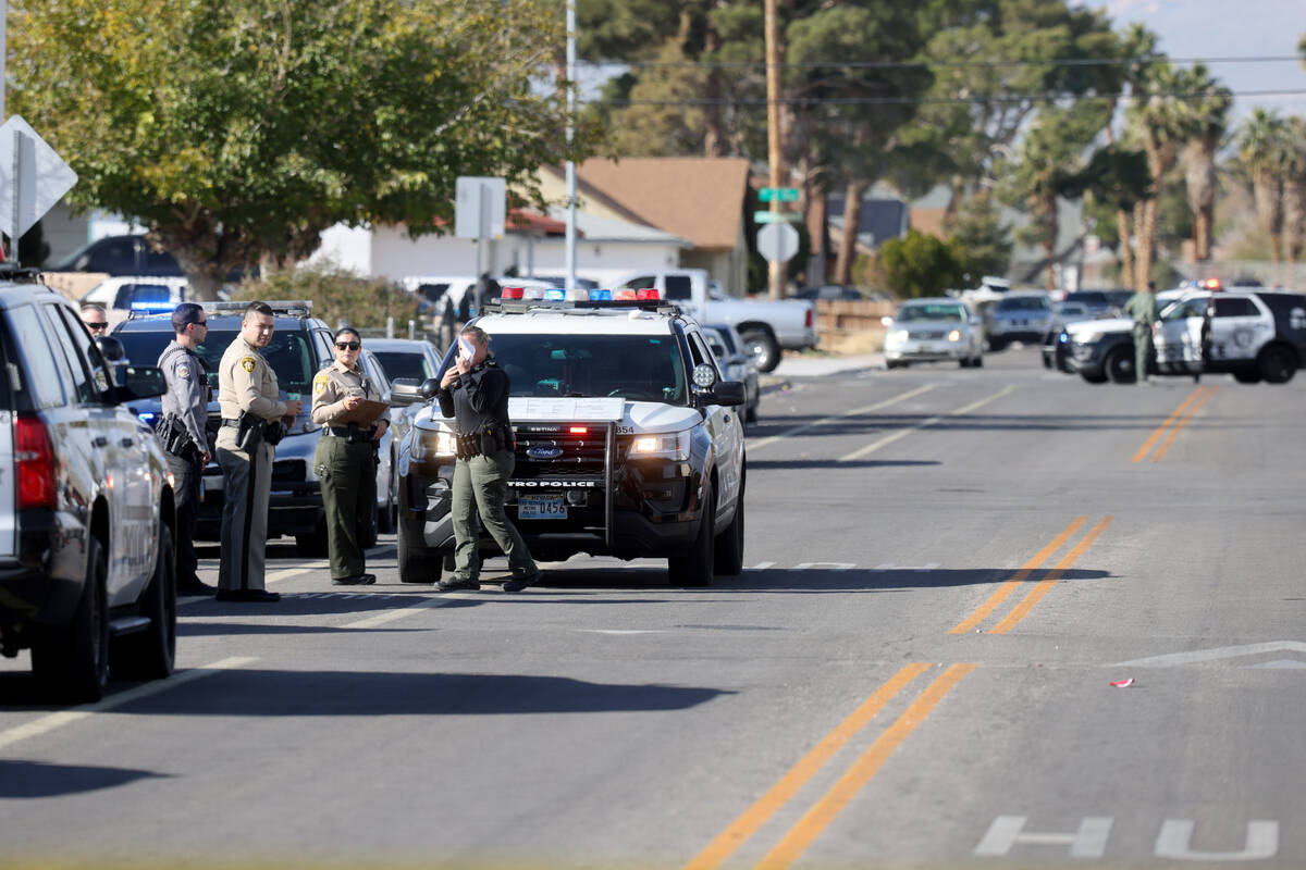 Las Vegas police investigate on Monroe Avenue near I Street on Thursday, Nov. 30, 2023. (K.M. C ...