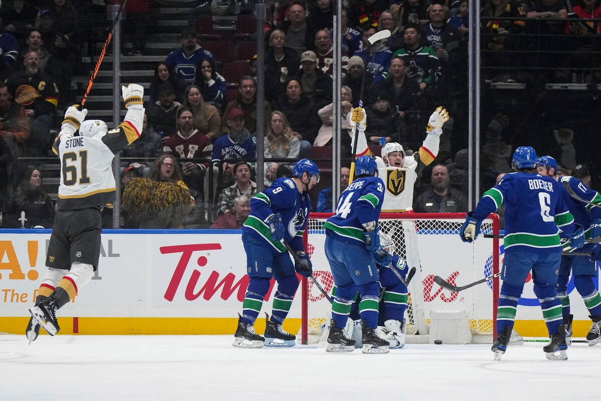 Vegas Golden Knights' Jack Eichel, rear center, and Mark Stone, left, celebrate a goal by Ivan ...