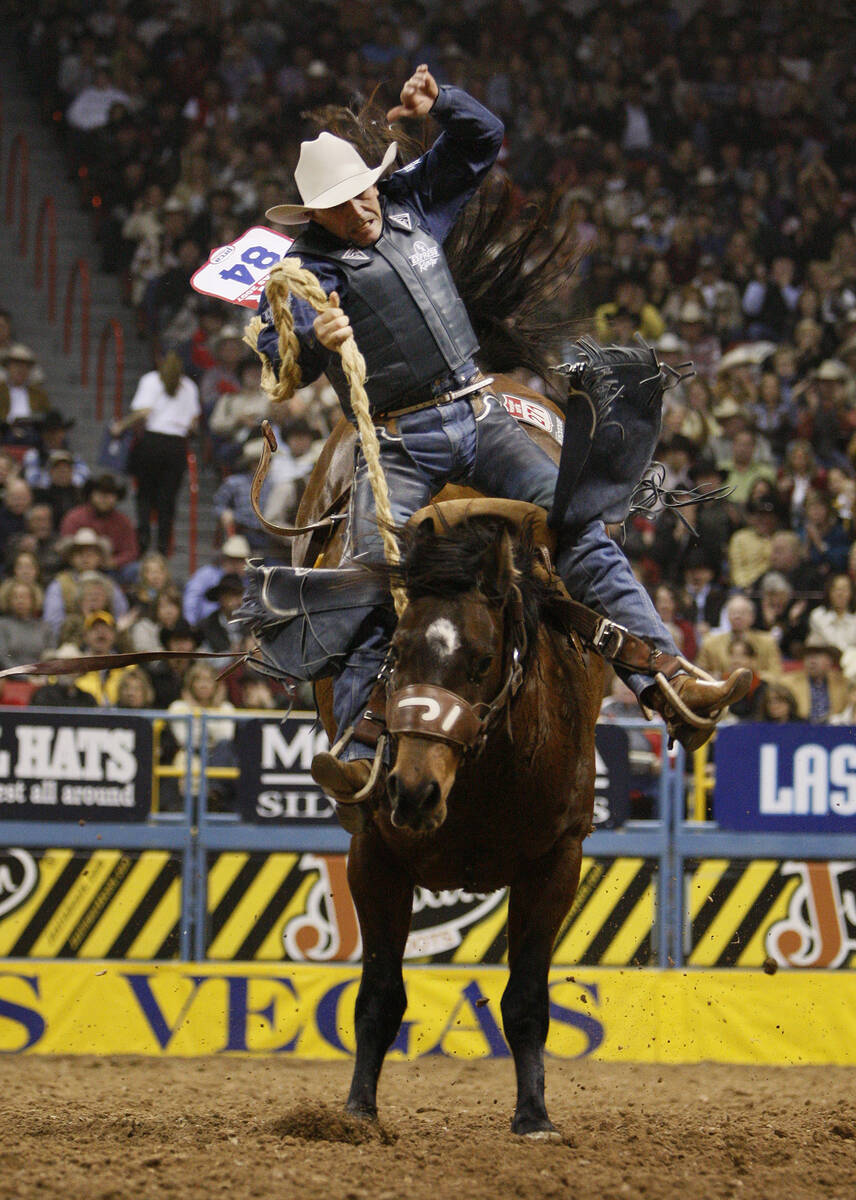 Bronc rider Billy Etbauer at the 2007 National Finals Rodeo at the Thomas & Mack Center. (John ...
