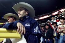 Billy Etbauer, of Edmond, Ok., leans on a chute, watching competitors during the 43rd Annual Wr ...