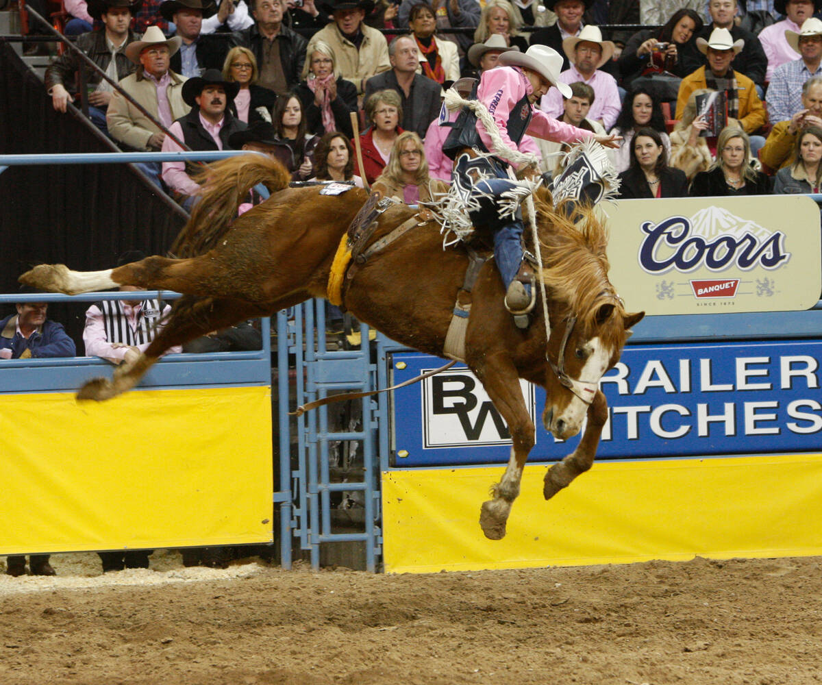 Saddle Bronc rider Billy Etbauer rides for a score of 90.00 points for a first place finish dur ...