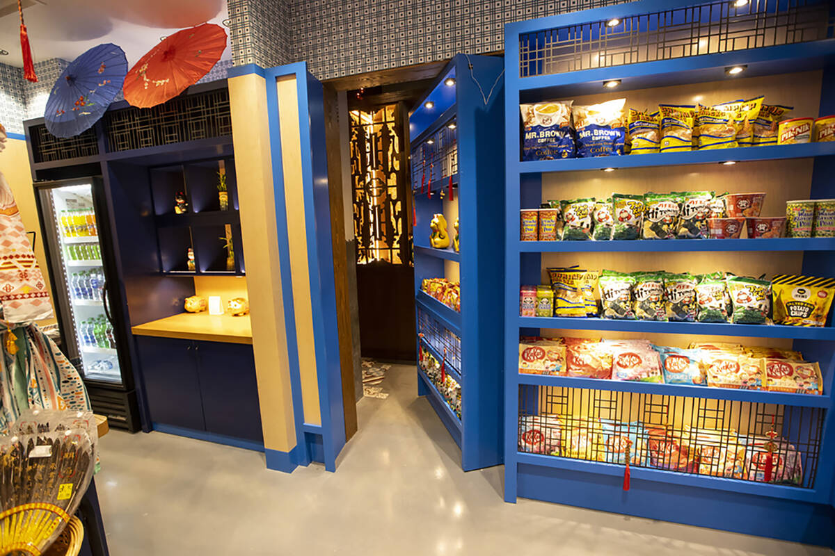 A shelf at Fuhu Cha Chan Teng in Resorts World Las Vegas moves to reveal the entrance to Here K ...