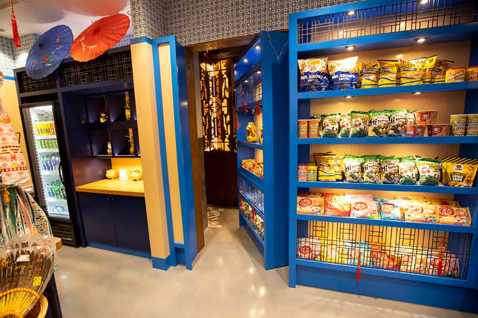 A shelf at Fuhu Cha Chan Teng in Resorts World Las Vegas moves to reveal the entrance to Here K ...