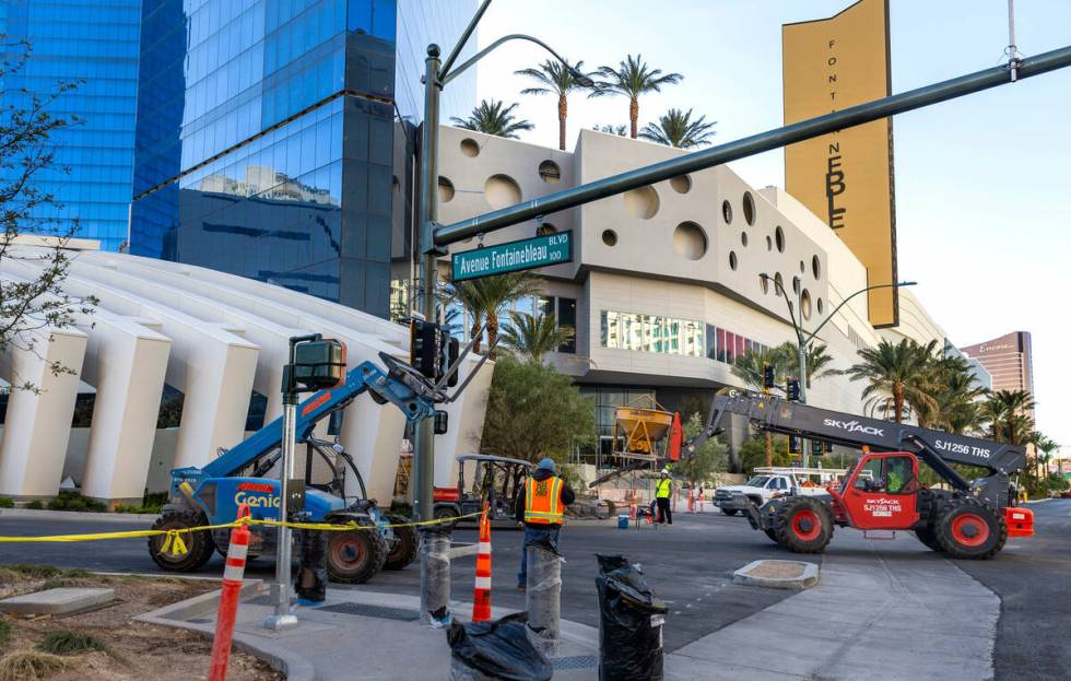 Construction workers are busy completing projects around the exterior at the Fontainebleau on N ...