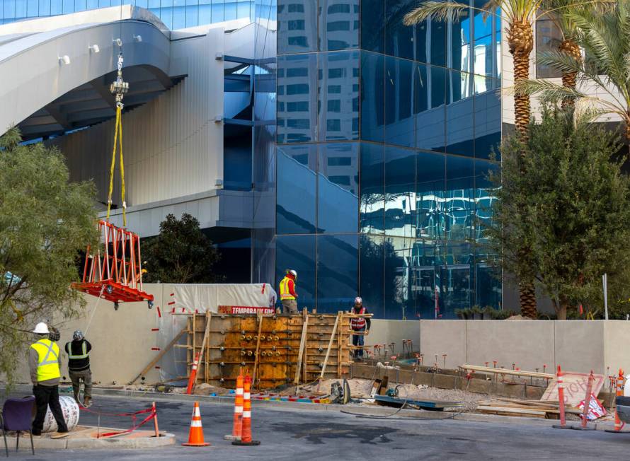 Construction workers are busy with projects nearing the end about the exterior at the Fontaineb ...