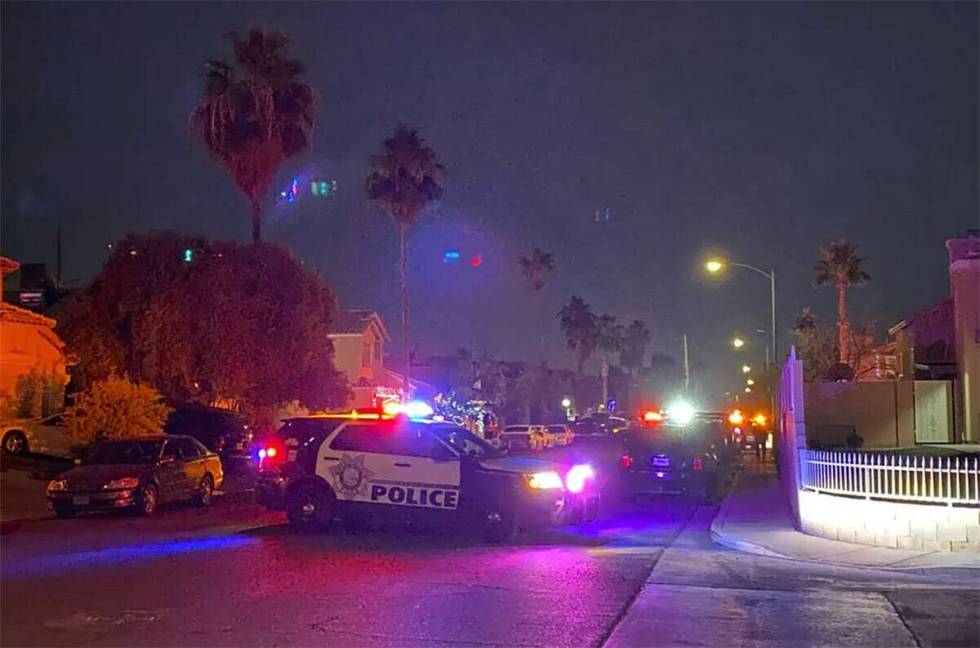 Las Vegas police at the scene of an officer-involved shooting near East Sahara Avenue and Sloan ...