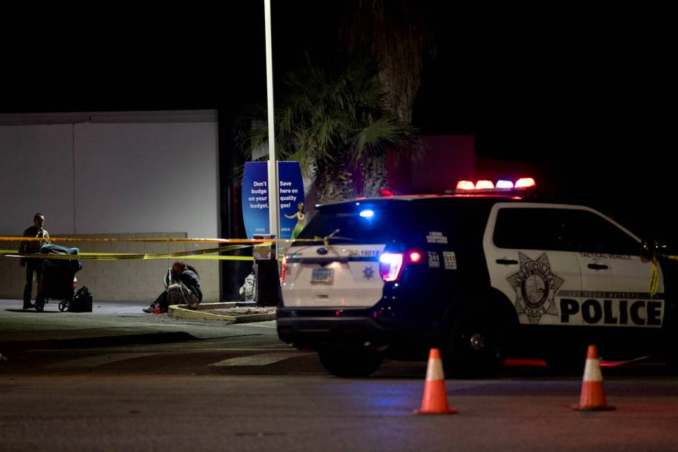 Las Vegas police investigate a fatal shooting at North Honolulu Street and East Charleston Boul ...