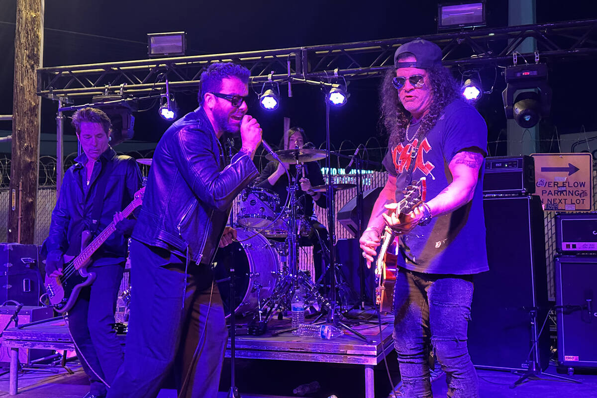 Vocalist Franky Perez jams with Slash at the reopening of Hard Hat Lounge on Industrial Road on ...