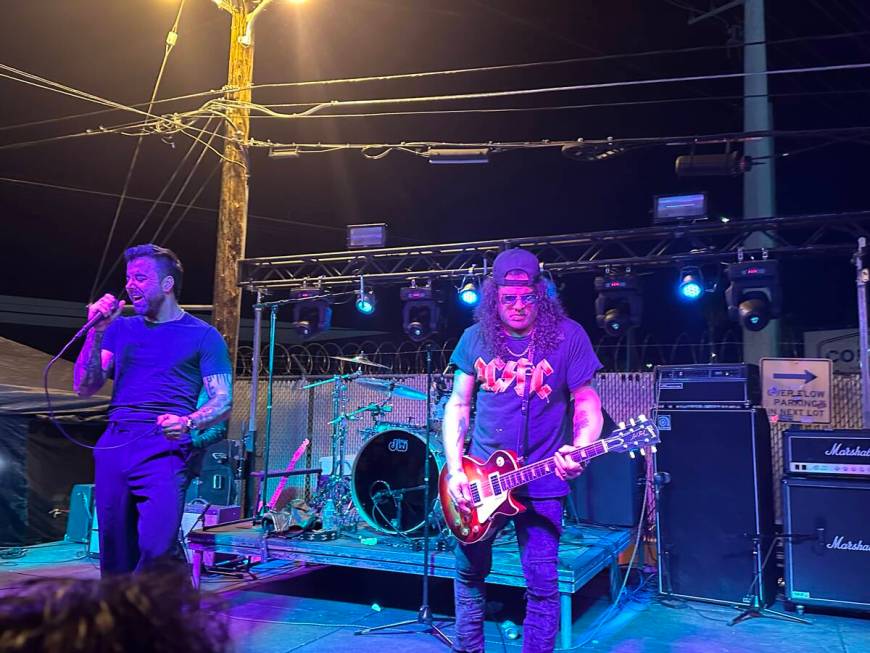 Vocalist Franky Perez jams with Slash at the reopening of Hard Hat Lounge on Industial Road on ...