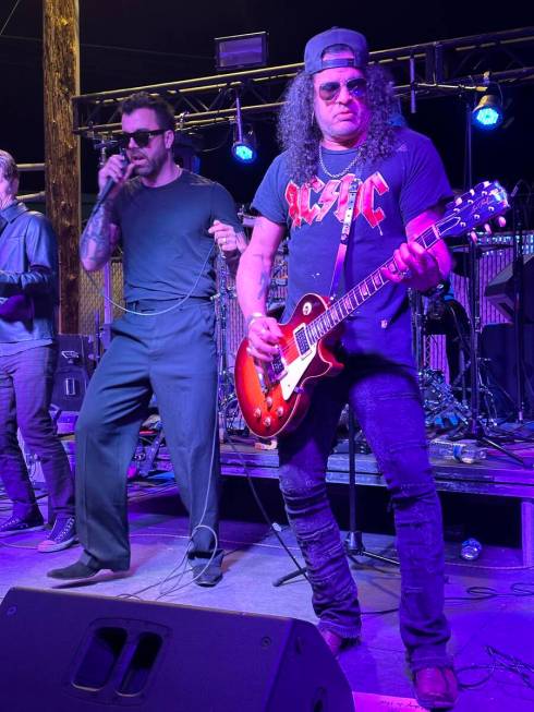 Vocalist Franky Perez jams with Slash at the reopening of Hard Hat Lounge on Industial Road on ...