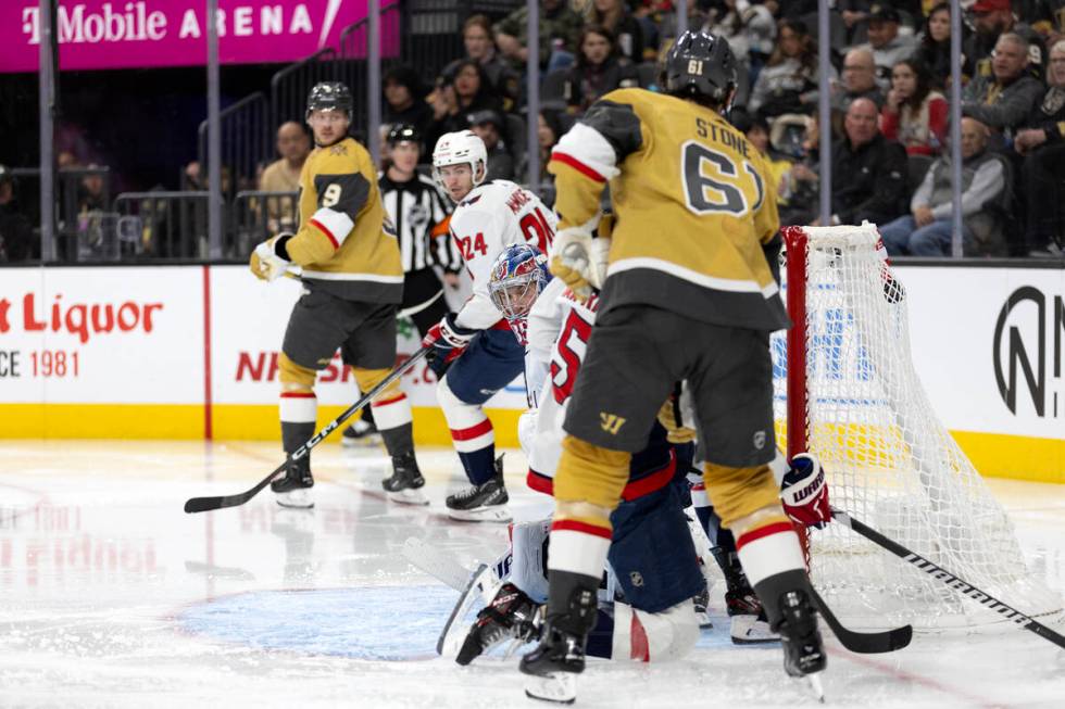 Golden Knights right wing Mark Stone (61) scores a goal on Capitals goaltender Darcy Kuemper (3 ...