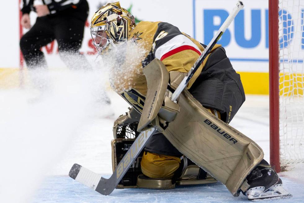 Golden Knights goaltender Logan Thompson (36) anticipates the puck during the second period of ...