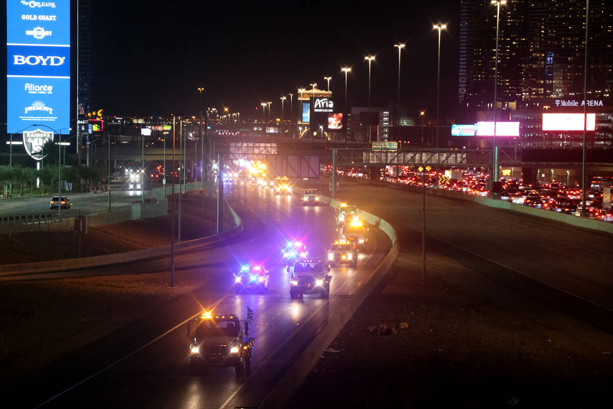 Tow truck operators, Nevada Highway Patrol and Capitol Police drive in a memorial procession on ...