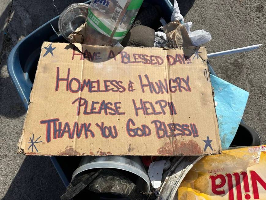 A cardboard sign at Charleston Boulevard and Honolulu Street in Las Vegas, where five homeless ...