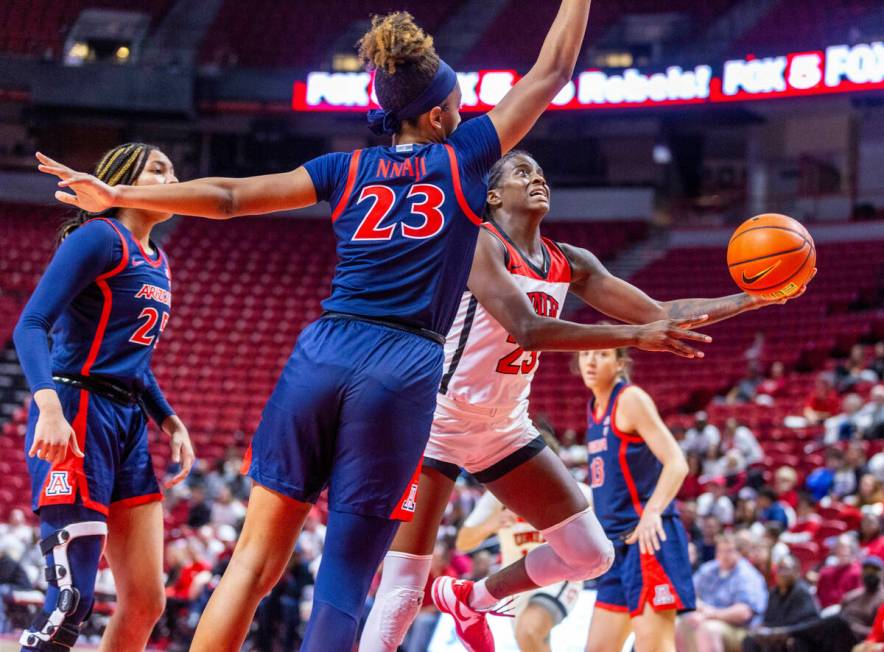 during the second half of their NCAA women's basketball game at the Thomas & Mack Center on ...