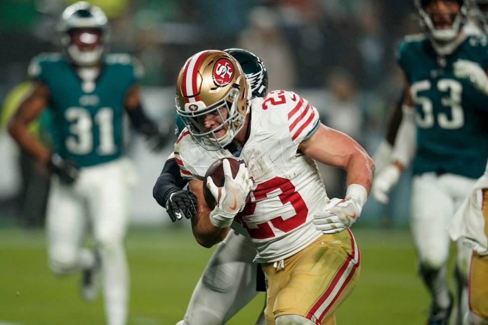 San Francisco 49ers running back Christian McCaffrey runs for a touchdown against the Philadelp ...