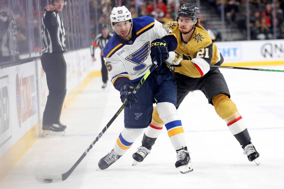 St. Louis Blues center Jordan Kyrou (25) skates past Vegas Golden Knights center Brett Howden ( ...