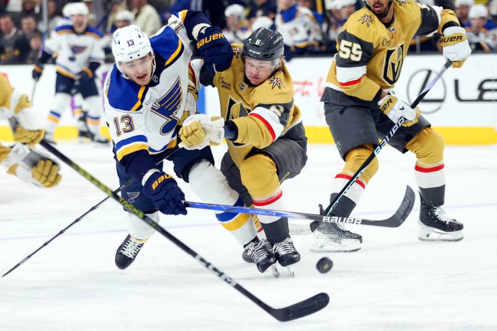 St. Louis Blues right wing Alexey Toropchenko (13) and Vegas Golden Knights defenseman Kaedan K ...