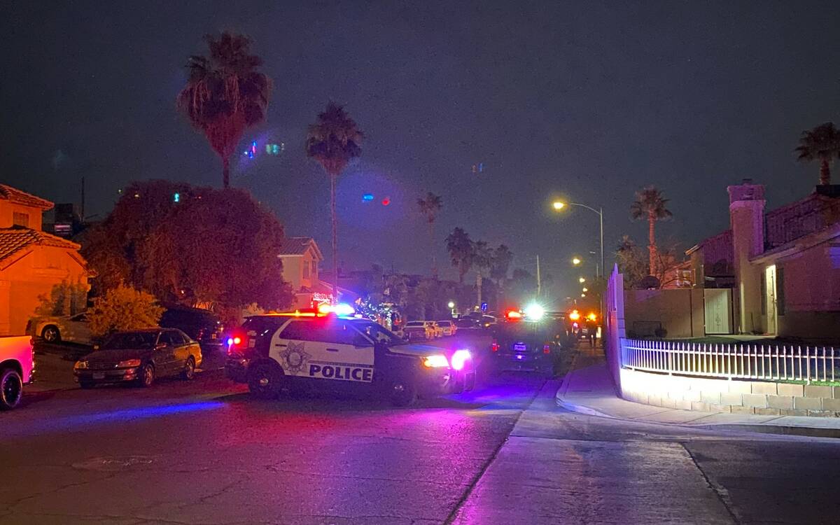 A Las Vegas police shooting was under investigation near Sloan Lane and Sahara Avenue on Wednes ...