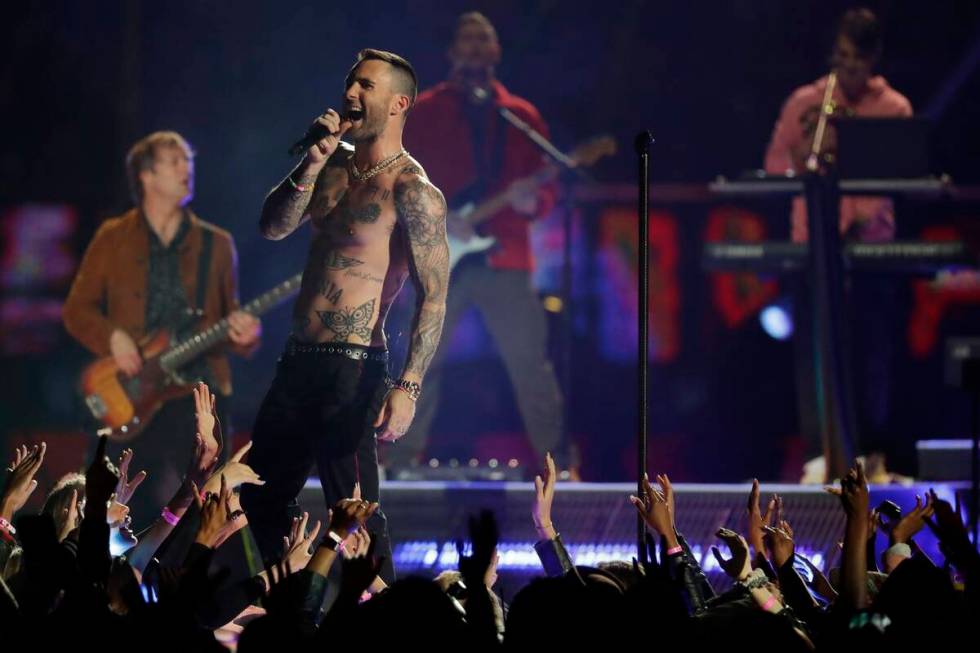 Adam Levine of Maroon 5 performs during halftime of the NFL Super Bowl 53 football game between ...