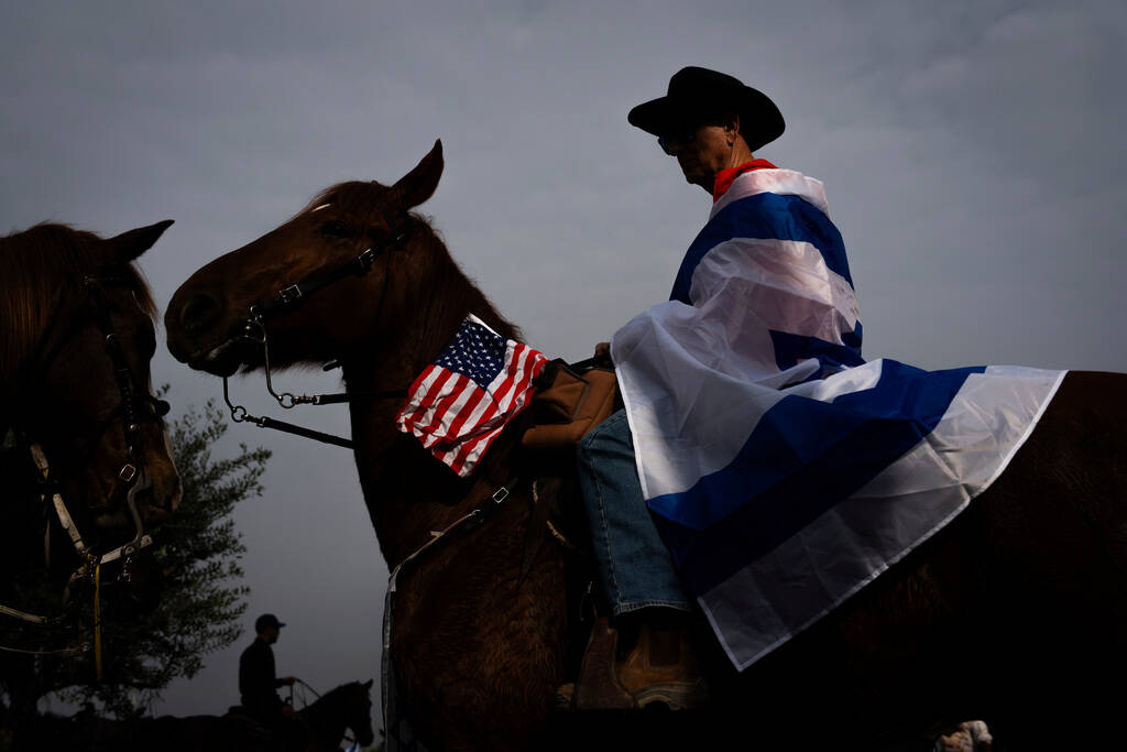 Family and supporters of Israeli hostages held by Hamas in Gaza gather for a horse ride calling ...