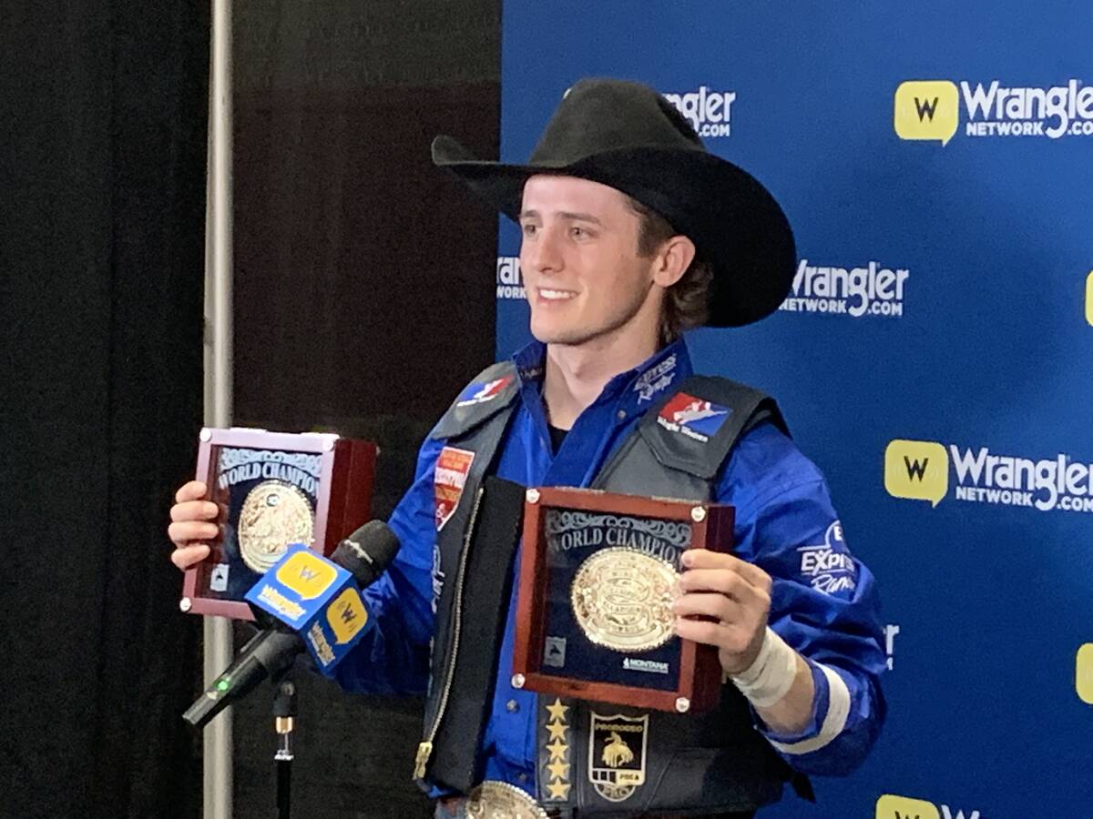 Stetson Wright displays his two world championship gold buckles after the final round of the 20 ...