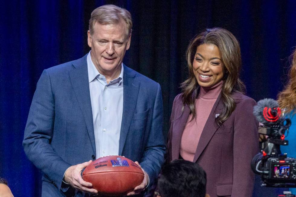 NFL commissioner Roger Goodell, left, poses with Raiders president Sandra Douglass Morgan durin ...