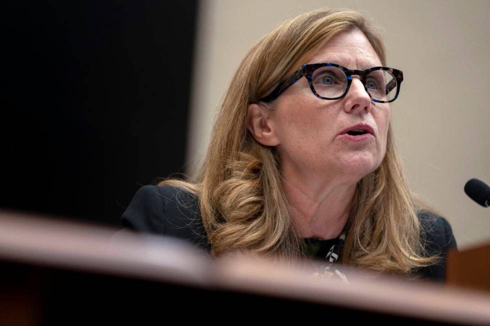 University of Pennsylvania President Liz Magill reads her opening statement during a hearing of ...