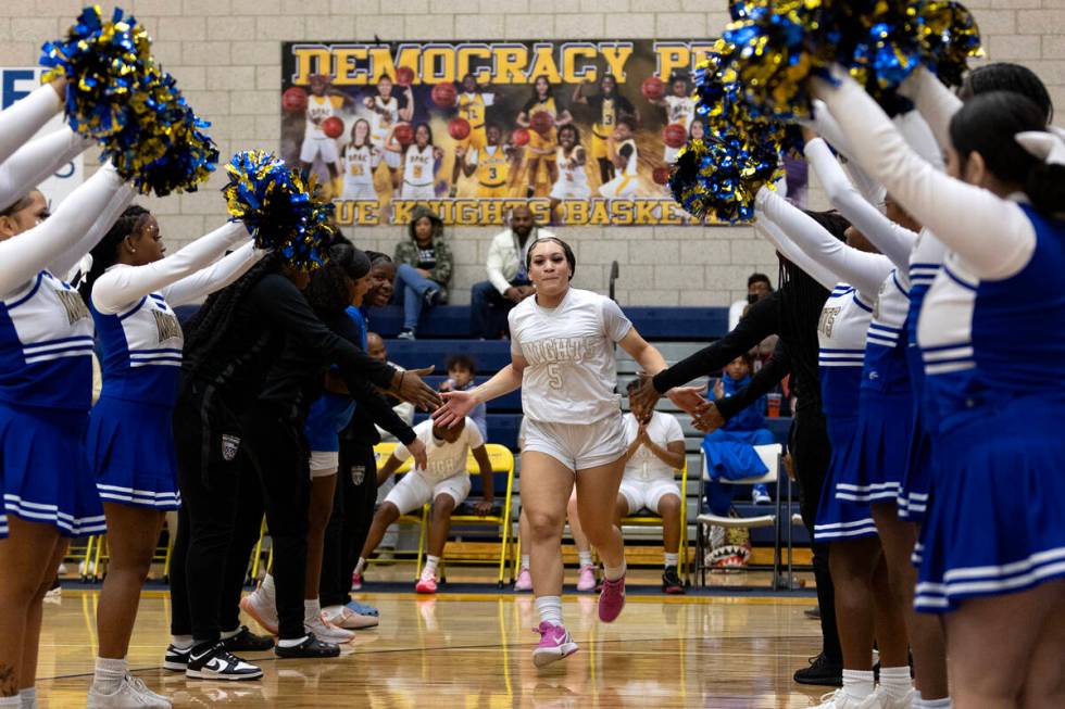 Democracy Prep’s Zayla Ellerbe (5) is announced in the starting lineup before a girls hi ...