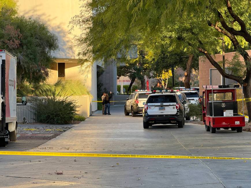 Police investigate between the Student Union and Beam Hall on the UNLV campus in Las Vegas Thur ...
