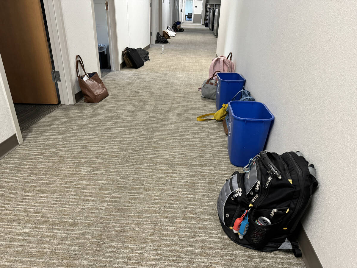 Backpacks and personal items are left behind on the UNLV campus in Las Vegas Thursday, Dec. 7, ...