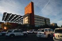 Police are seen at the scene of a shooting on the UNLV campus on Wednesday, Dec. 6, 2023, in La ...