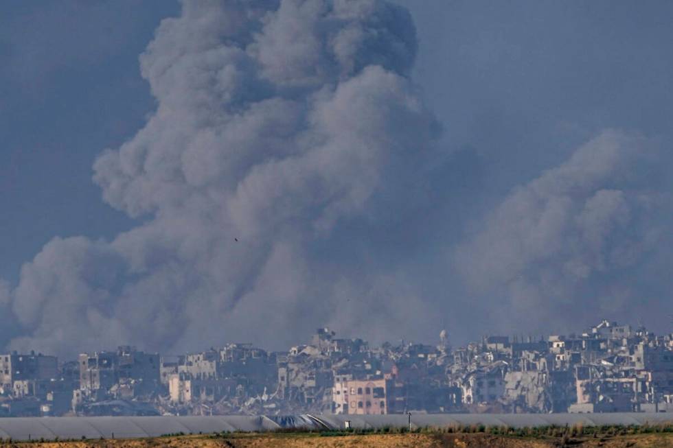 Smoke rises following an Israeli bombardment in the Gaza Strip, as seen from southern Israel, W ...