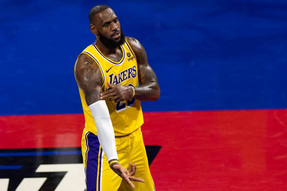 Los Angeles Lakers forward LeBron James (23) celebrates after scoring during the second half of ...