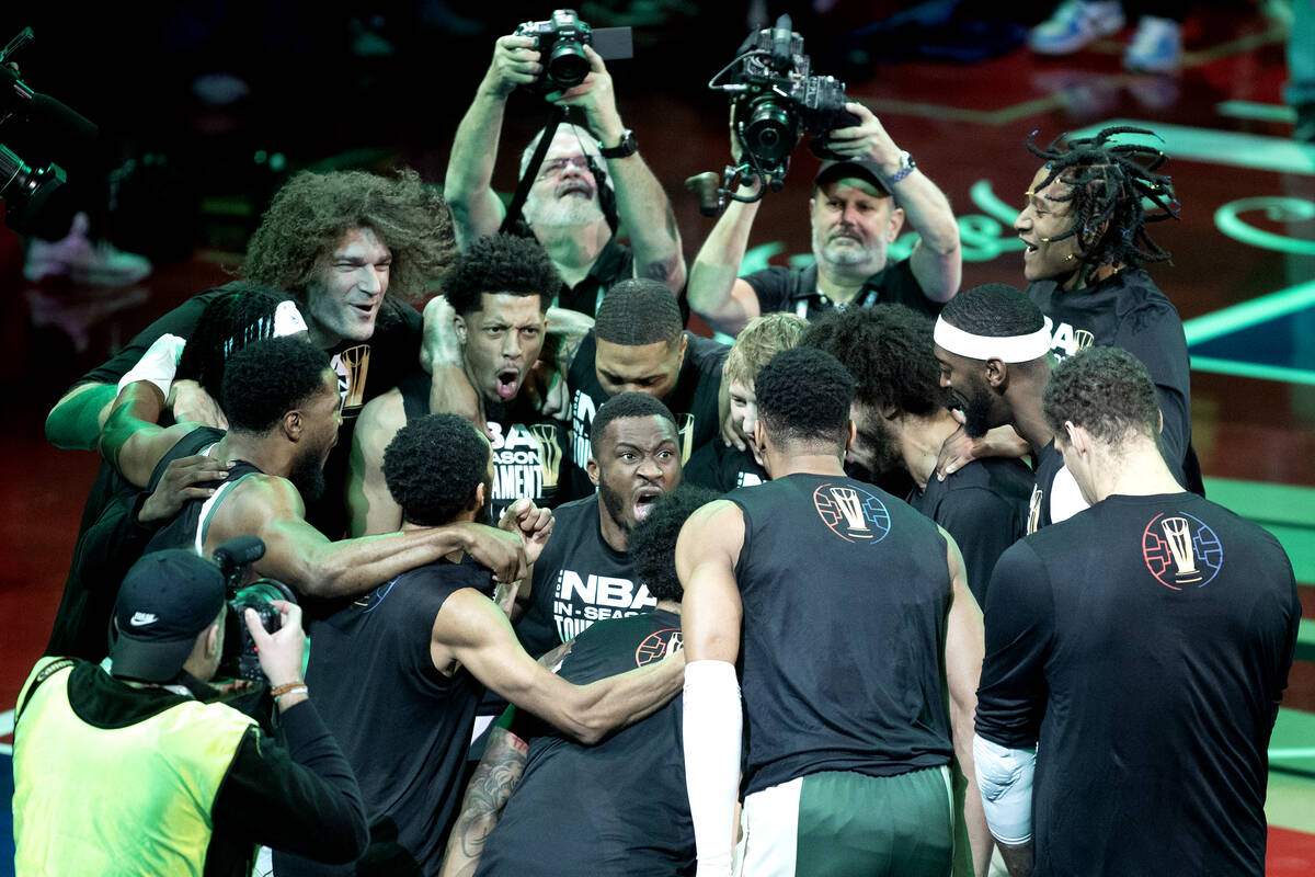 The Milwaukee Bucks get pumped up before an NBA In-Season Tournament semifinal game against the ...