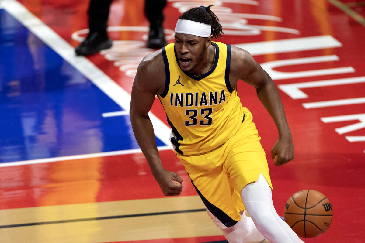 Indiana Pacers center Myles Turner (33) dunks after celebrating during the second half of an NB ...