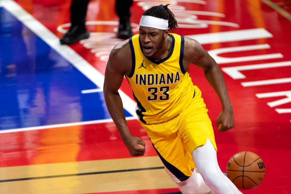 Indiana Pacers center Myles Turner (33) dunks after celebrating during the second half of an NB ...