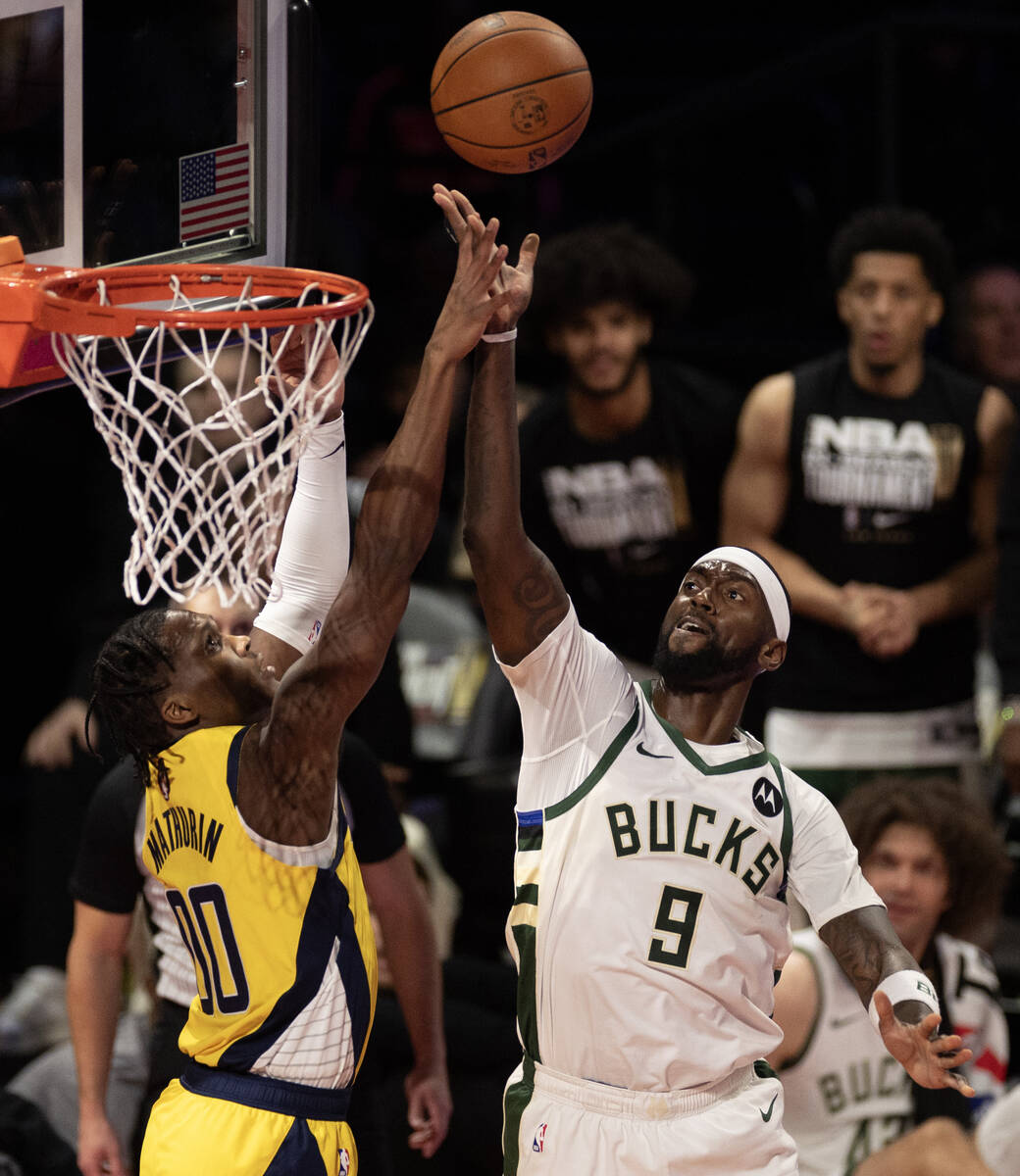 Milwaukee Bucks forward Bobby Portis (9) shoots against Indiana Pacers guard Bennedict Mathurin ...