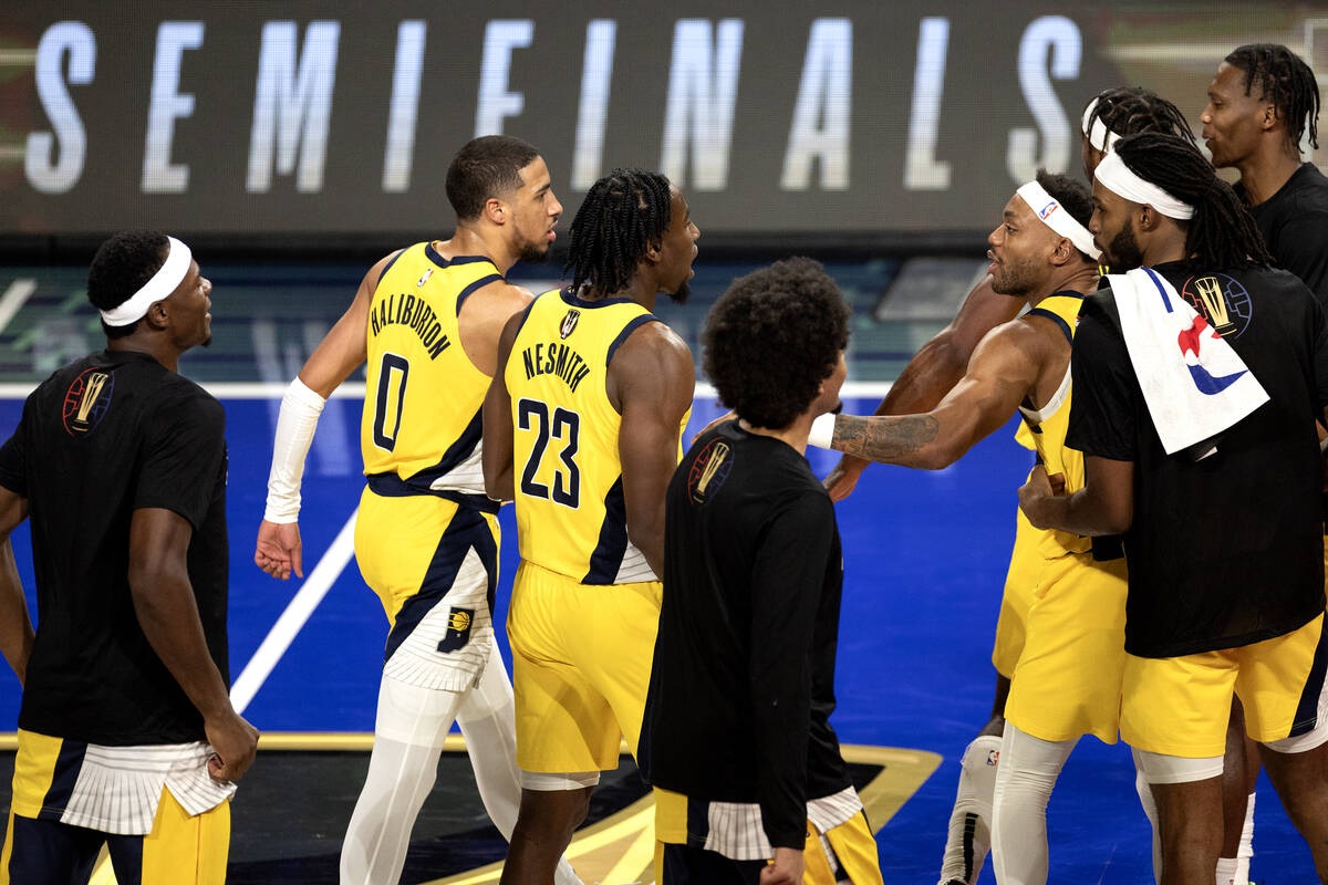 The Indiana Pacers celebrate as they are winning in the final minutes of an NBA In-Season Tourn ...