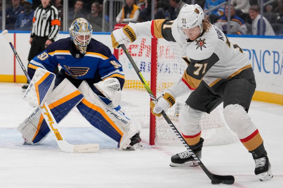 Vegas Golden Knights' William Karlsson (71) handles the puck as St. Louis Blues goaltender Jord ...