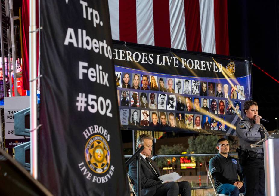 Lt. Chelsea Stuenkel speaks about her officers during a candlelight vigil for Nevada Highway Pa ...