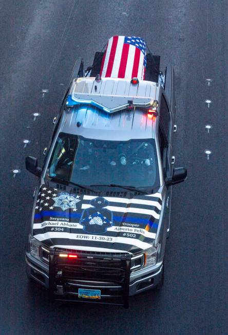 The casket of Nevada State Trooper Alberto Felix moves down the Las Vegas Strip during a proces ...