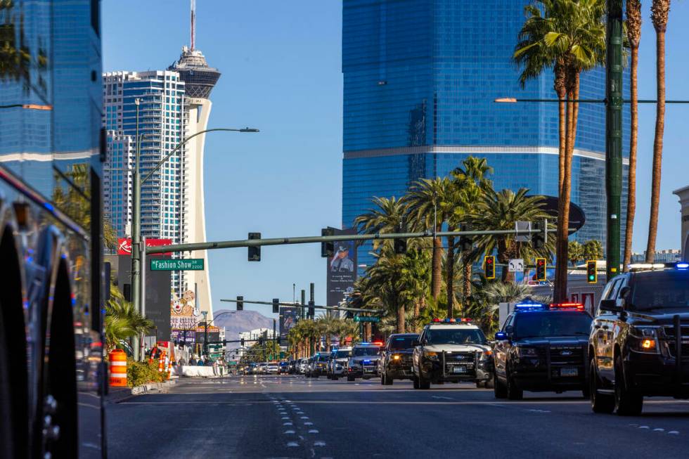A procession for Nevada State Trooper Alberto Felix moves down the Las Vegas Strip on Friday, D ...