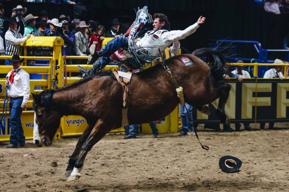 Kade Sonnier rides Irish Eyes during the first go-round of bareback riding at the National Fina ...