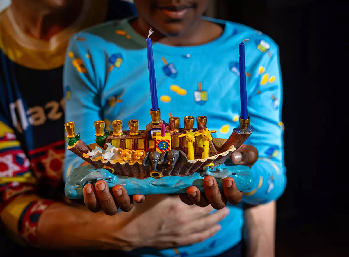 Jack Kulbersh holds his favorite Menorah. (Jason Armond/Los Angeles Times/TNS)