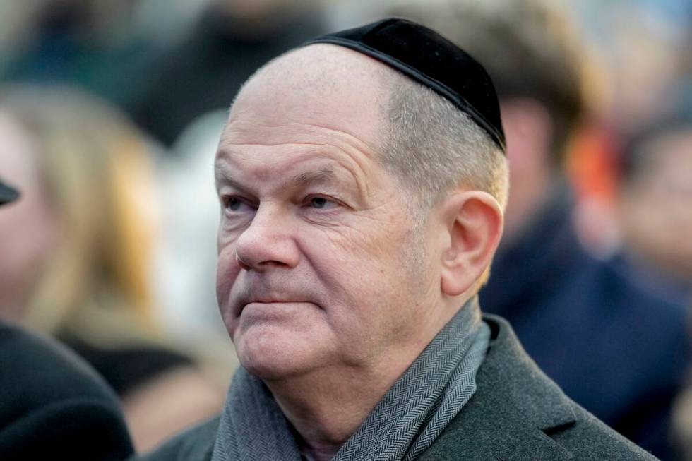 German Chancellor Olaf Scholz attends the ceremony to light the first candle of Hanukkah menora ...