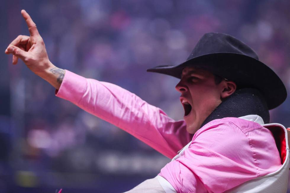 Jayco Roper celebrates his ride while competing in bareback riding on day four of the National ...